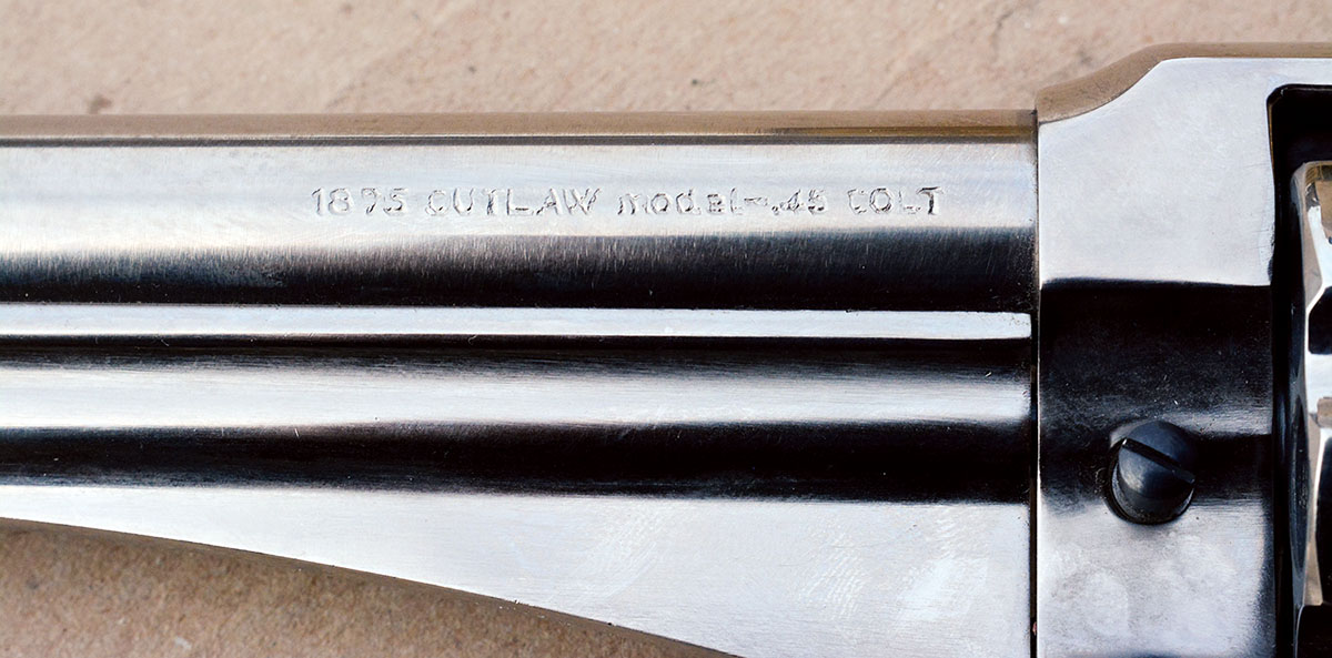 The “1875 Outlaw Model” barrel marking.